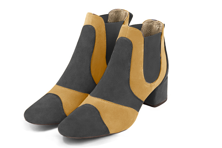 Dark grey and mustard yellow women's ankle boots, with elastics. Round toe. Low flare heels. Front view - Florence KOOIJMAN